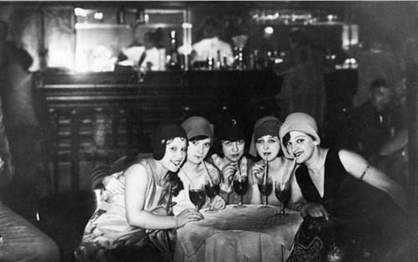 young girls drinking at a speakeasy during Prohibition