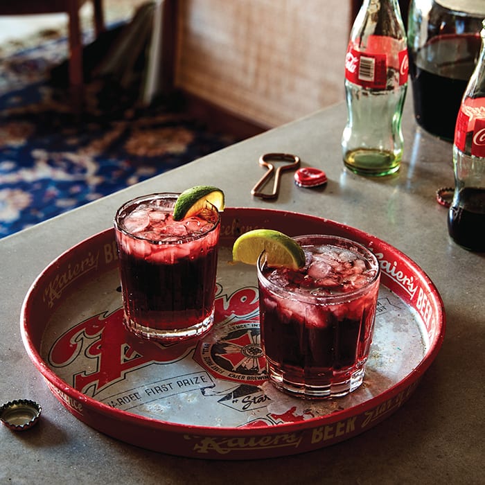 Two Calimocho cocktails sitting on a counter